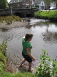 SX22927 Jenni wading through Clun river next to perfectly good bridge.jpg